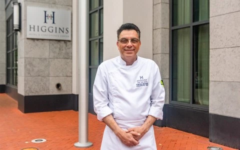 chef Virgile Brandel standing in front of the hotel6