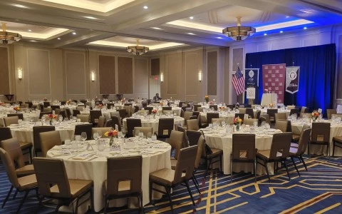 a large room with tables and chairs10