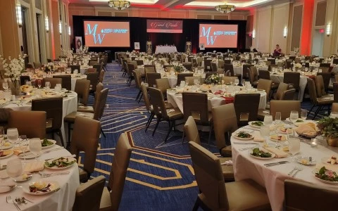 a large room with tables and chairs9