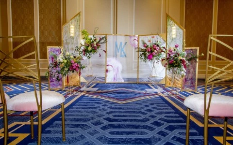 chairs in front of wedding spot with flowers 60