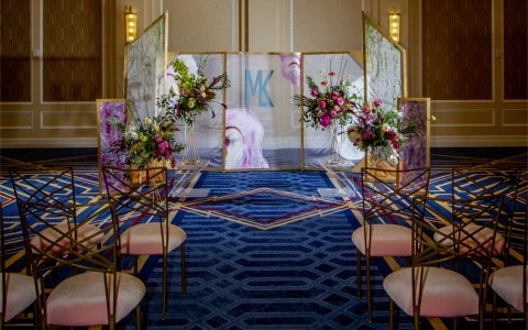 chairs in front of wedding spot with flowers 14