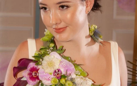 woman with a wedding dress and some flowers around her neck 13
