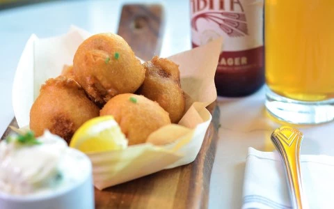 beignets with side lemon and dip 16