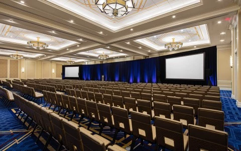 hilliard conference room with chairs and two big screens 19