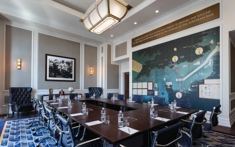 hilliard conference room with a big meeting table and a map on the wall 18