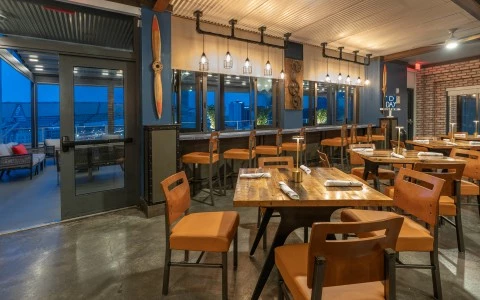 a room with tables and chairs