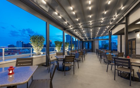 a restaurant with tables and chairs