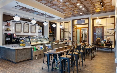 provisions room coffee with chairs and tables 0