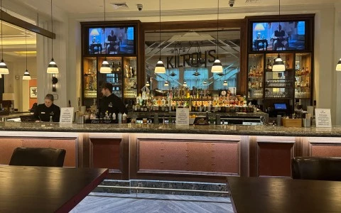 a bar with a person behind the counter11