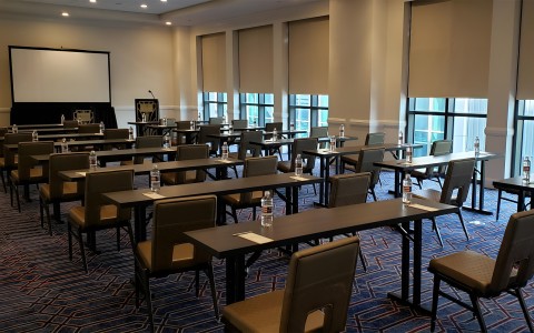 a room with tables and chairs