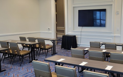 a room with tables and chairs