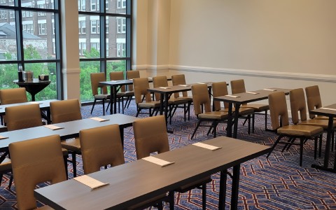 a room with tables and chairs