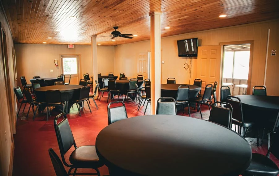 a room with tables and chairs