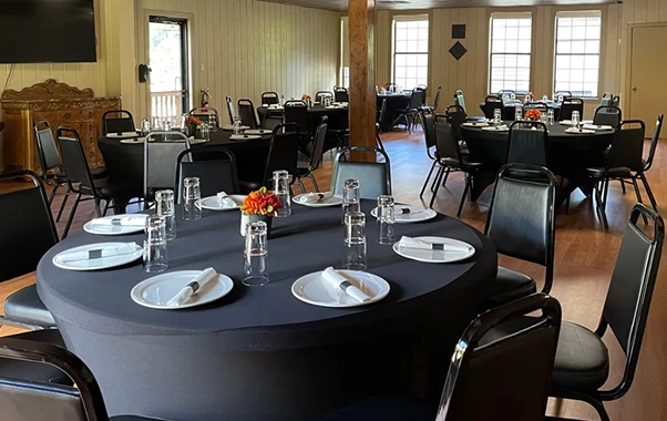a room with tables and chairs