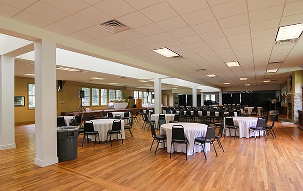 a room with tables and chairs