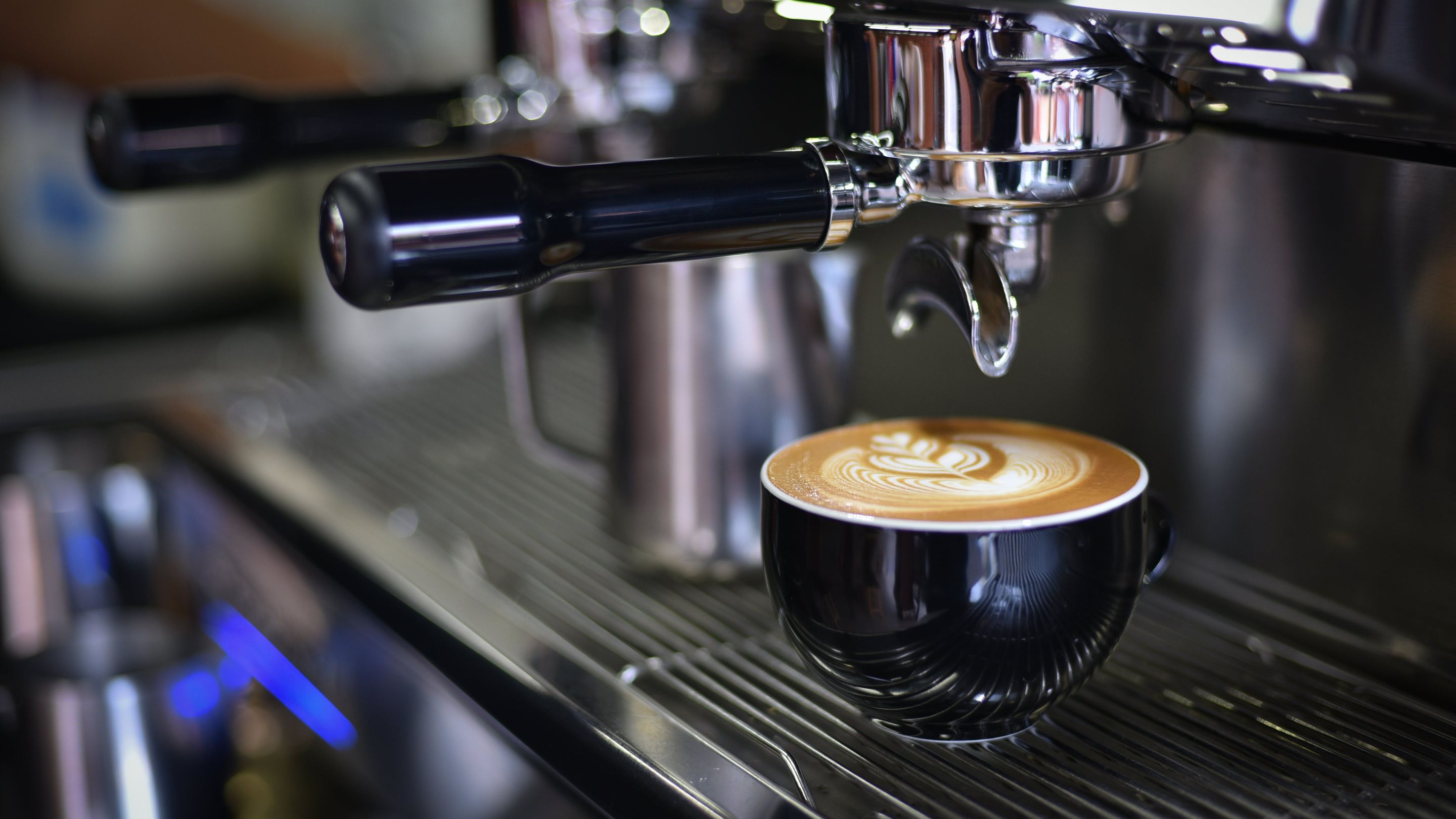 a coffee machine making a cup of coffee