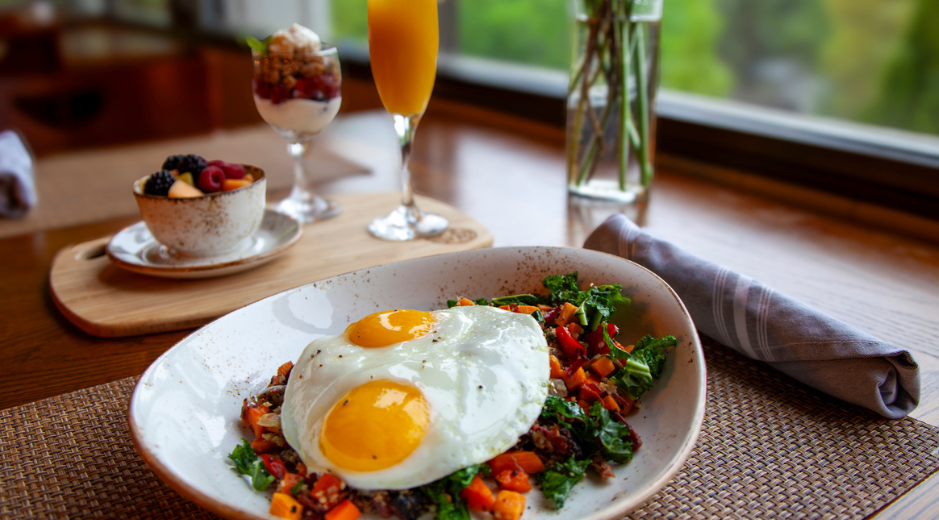 a plate of food with two eggs on it