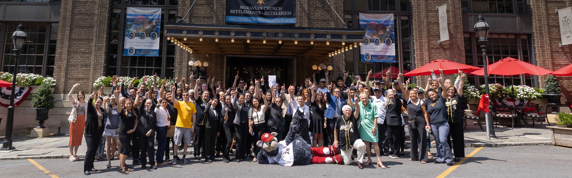 a group of people posing for a photo
