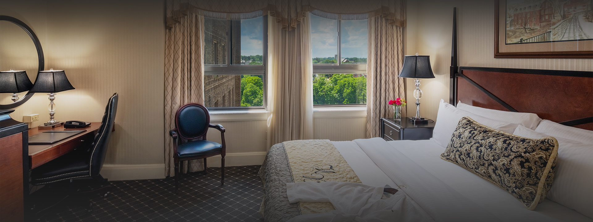 a bedroom with a bed and a chair