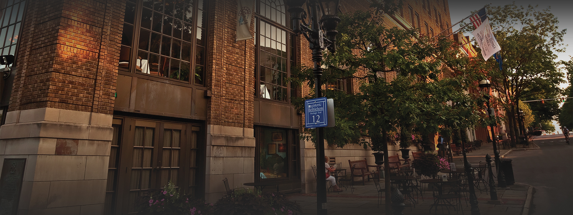 a street light with a sign on it