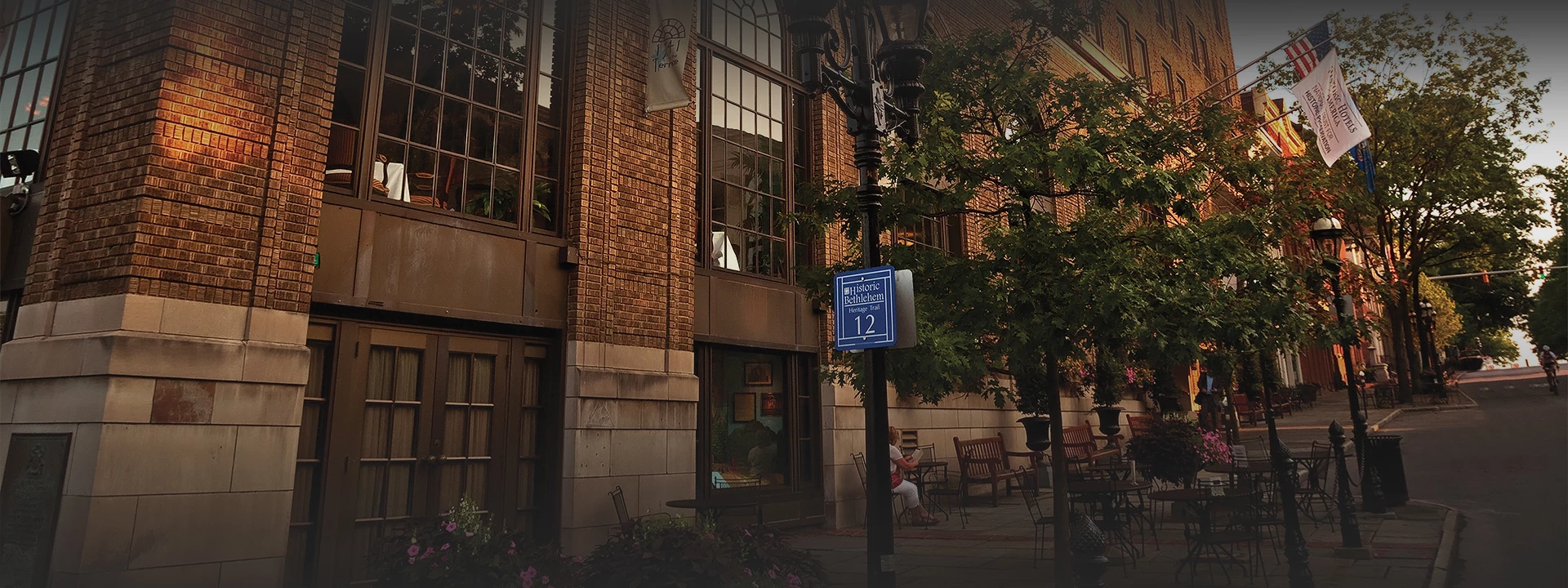 a street light with a sign on it