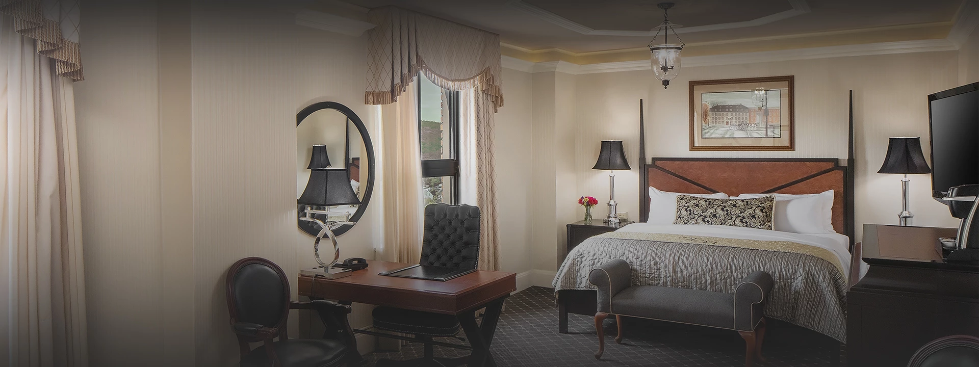 a bedroom with a desk and chair