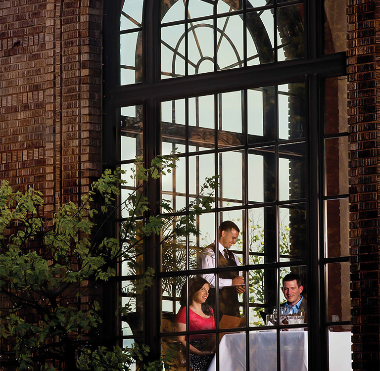 a group of people standing in a window