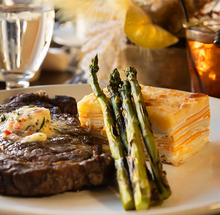 a plate of food with asparagus and asparagus