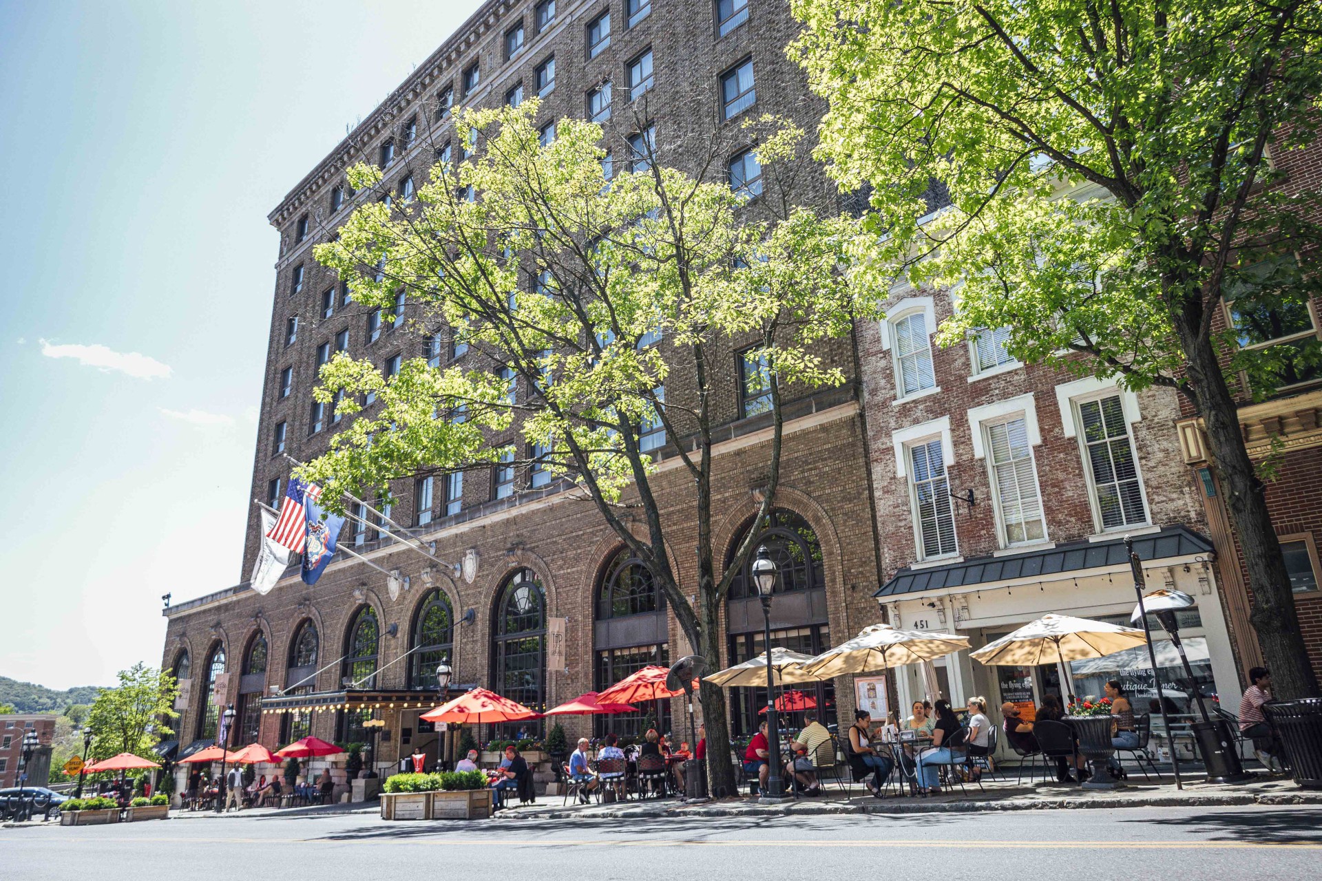 a group of people sitting outside a building