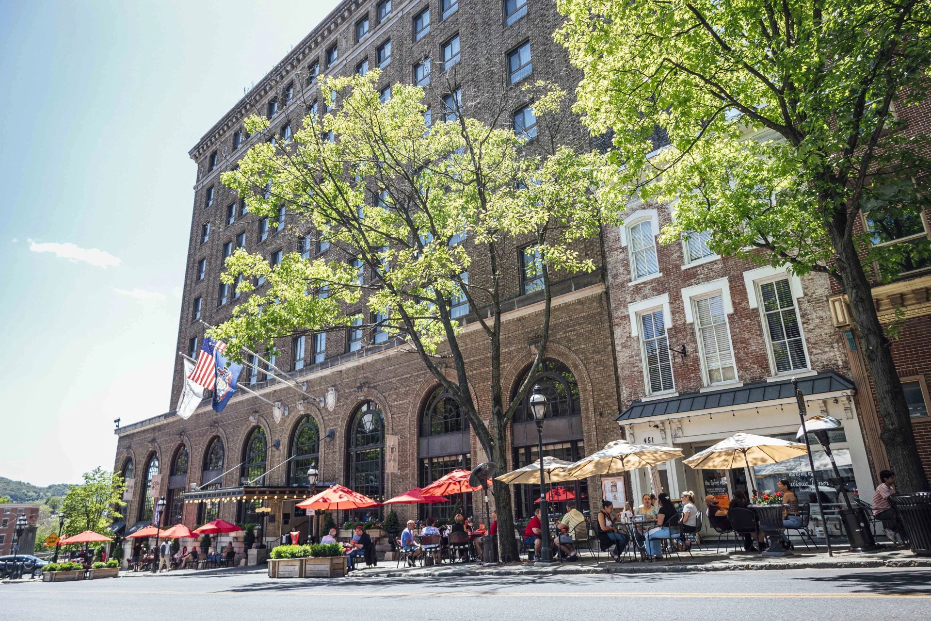 a group of people sitting outside a building