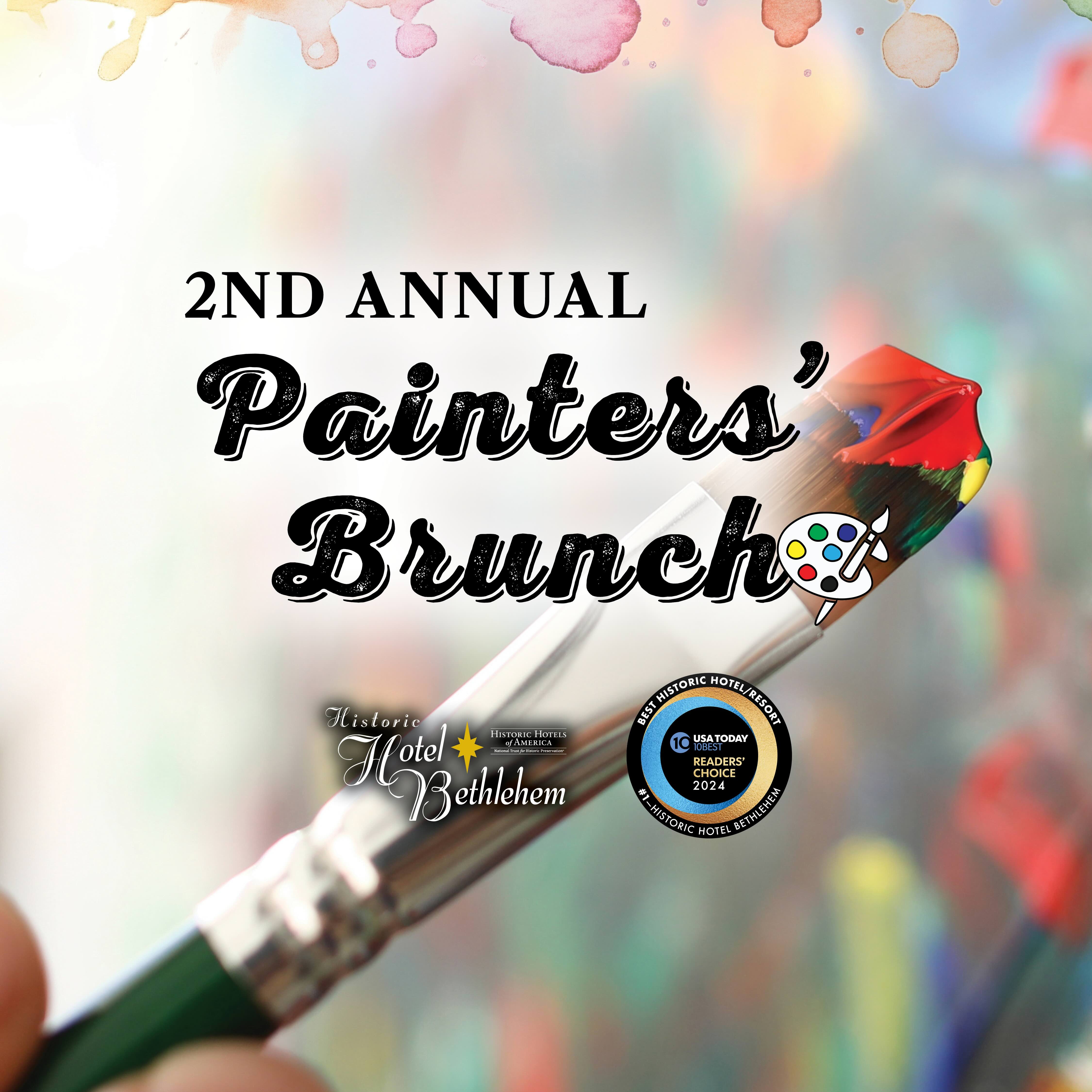 a paintbrush in a hand