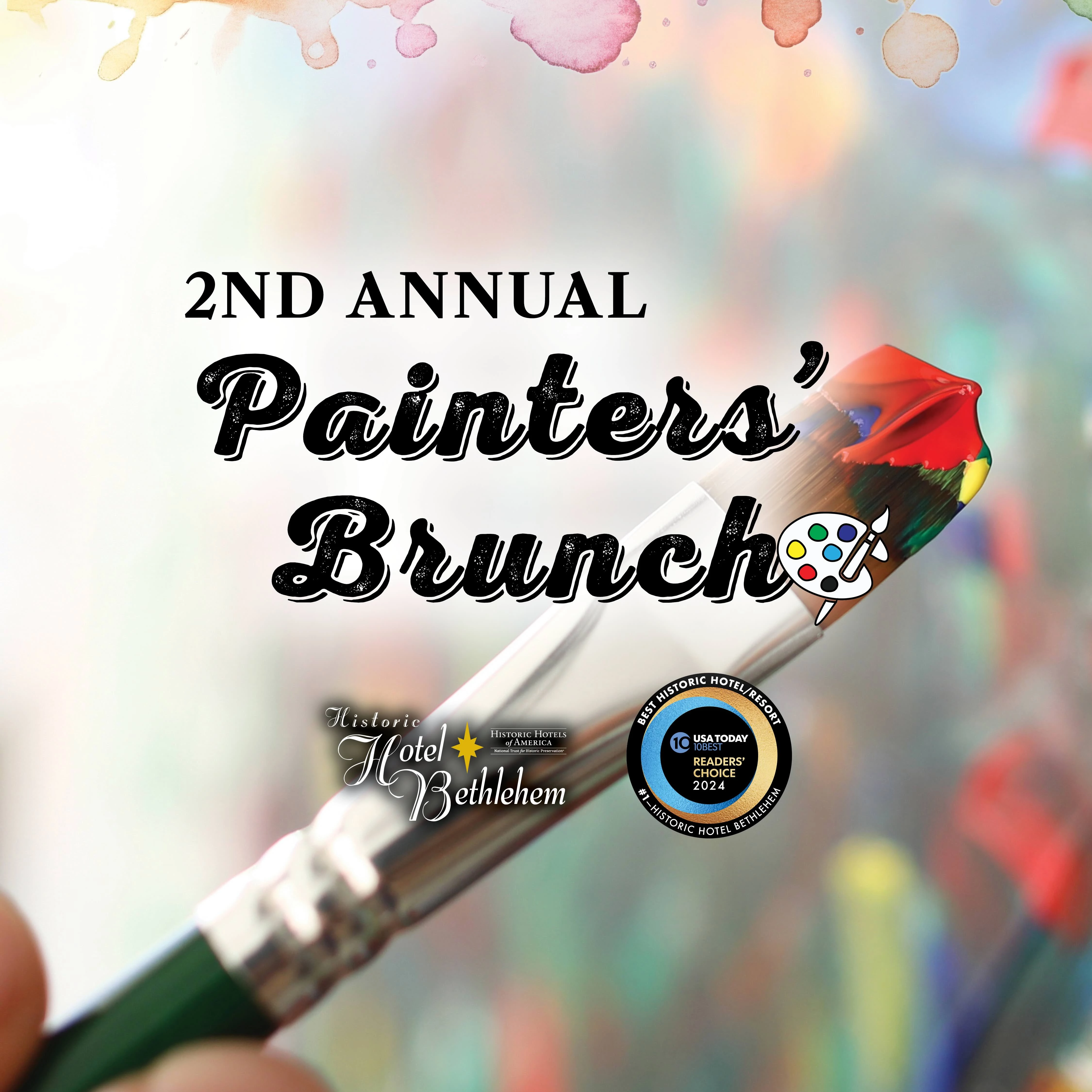 a paintbrush in a hand