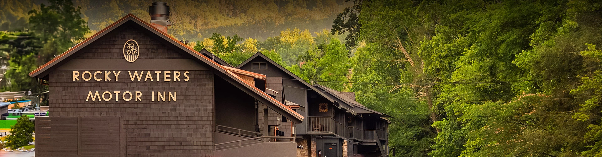 a row of houses with trees in the background