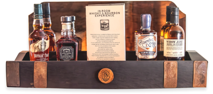 a couple of bottles of liquor on a shelf
