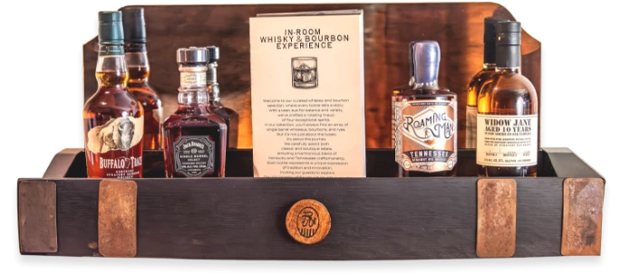 a couple of bottles of liquor on a shelf