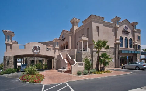 exterior of hotel with archway front entrance