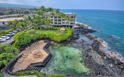 Aerial view of side of the hotel surrounded by the beautiful sea