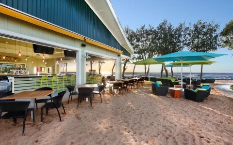 Outside view of a hotel restaurant next to the beach