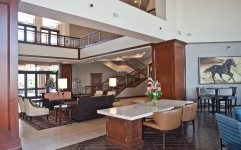hotel lobby with horse painting on wall