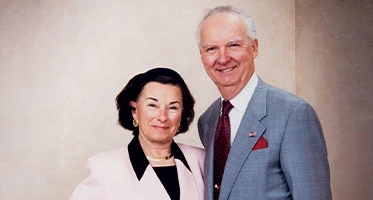 a man and a woman smiling