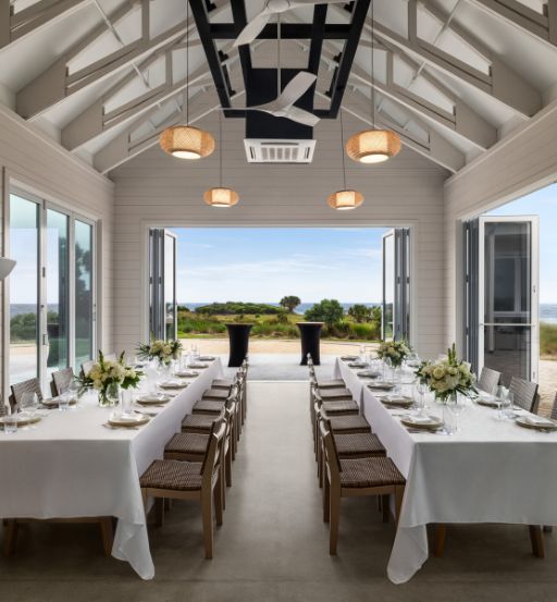 a room with tables and chairs