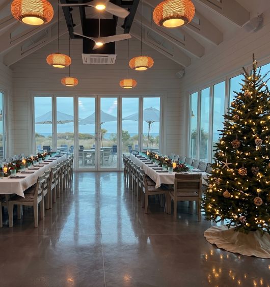 a room with a christmas tree and lights