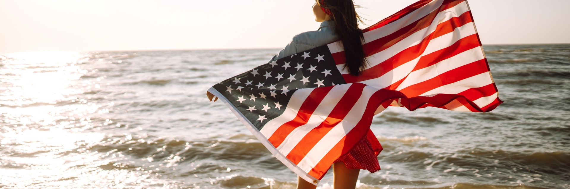 a woman holding a flag