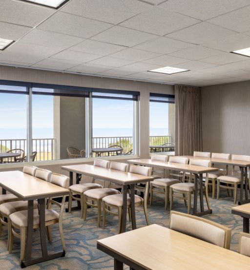 a room with tables and chairs