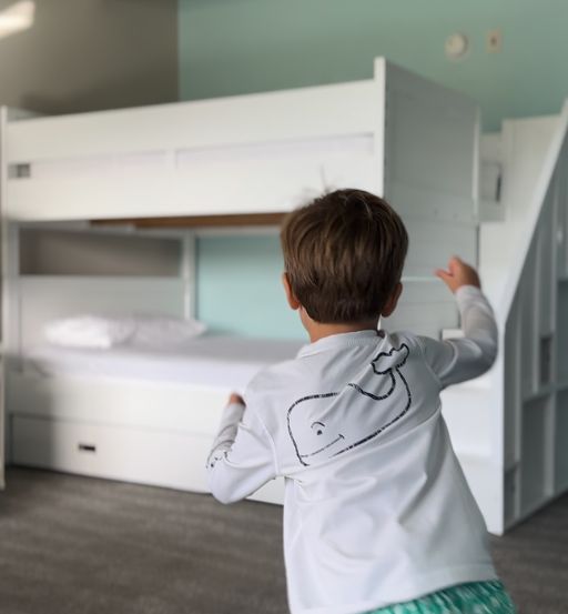 a boy in a white shirt