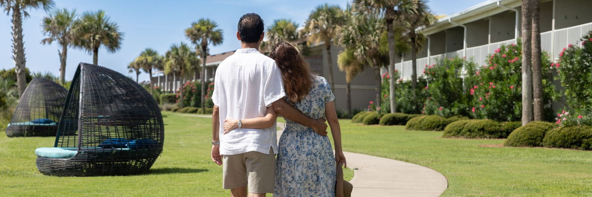 a man and woman holding hands