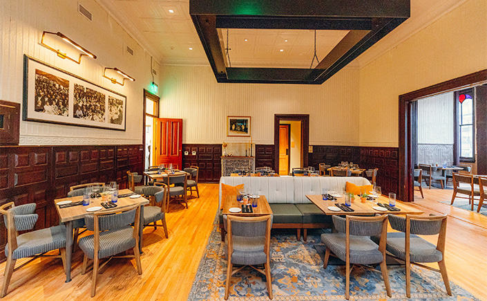 a room with tables and chairs