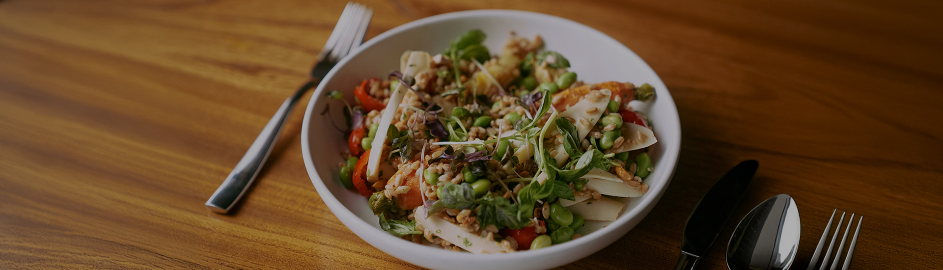 a bowl of food with a fork