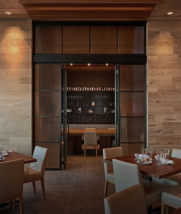 a room with a table and chairs