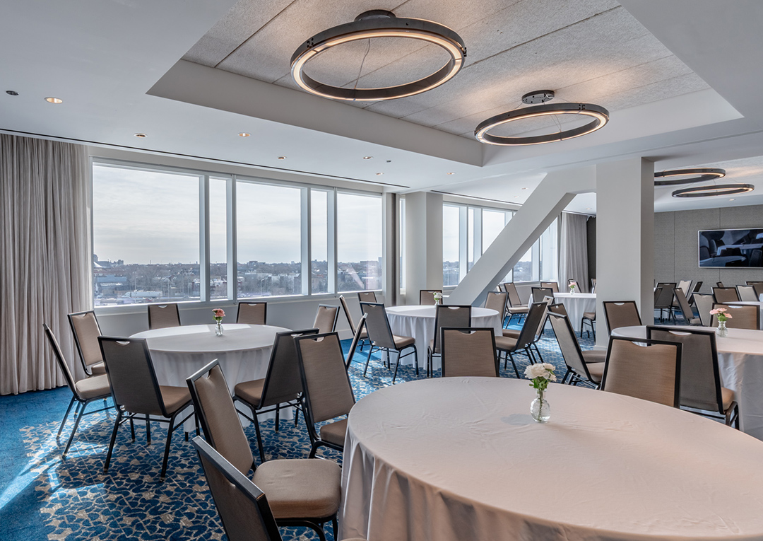 a room with tables and chairs